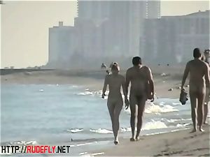 voyeurism at a steaming nudist couple on the beach