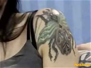 stunner with lots of tats and piercing gets buttfuck